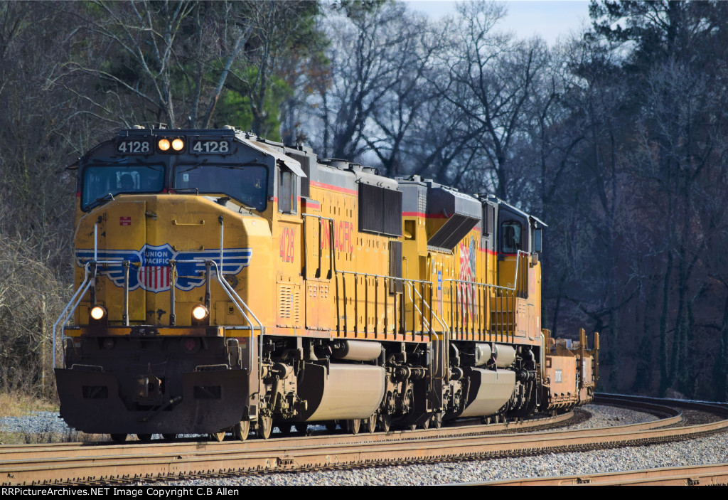 UP 4128 Leads a NB Empty Well Train